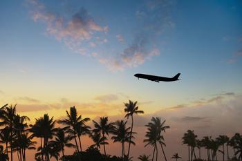Why Azul Stock Lost Altitude This Week: https://g.foolcdn.com/editorial/images/773397/silhouette-of-airplane-flying-over-palm-trees-in-sunset-getty.jpg