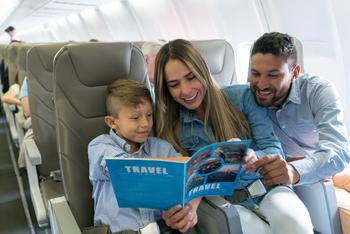 Why Shares in United Airlines Were Higher This Week: https://g.foolcdn.com/editorial/images/773496/family-trip-on-airplane-reading-to-son-1200x800-5b2df79.jpg