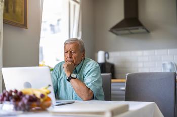 The Shocking Reason You Might Lose Some of Your Social Security Benefits: https://g.foolcdn.com/editorial/images/743356/older-man-laptop-upset-gettyimages-1402178649.jpg