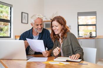 3 Social Security Strategies to Bankroll Your Retirement: https://g.foolcdn.com/editorial/images/704365/happy-mature-couple-looking-at-document.jpg