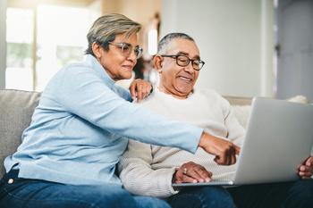 Is 67 the Optimal Age to Claim Social Security?: https://g.foolcdn.com/editorial/images/732960/two-people-at-a-laptop_gettyimages-1354347280.jpg