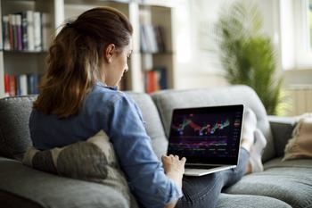 2 High-Yield Dividend Stocks You Could Hold for Years: https://g.foolcdn.com/editorial/images/701235/dividends-woman-laptop-stock-charts.jpg