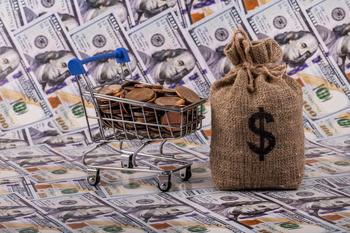 2 High-Yield Dividend Stocks I Can't Stop Buying: https://g.foolcdn.com/editorial/images/836769/dividends-cart-full-of-money-on-hundred-dollar-bills.jpg