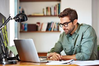Worried You Can't Make Your Student Loan Payments This October? Here's Why Forbearance Isn't as Great an Option as You Think: https://g.foolcdn.com/editorial/images/746896/man-20s-glasses-laptop-gettyimages-692908426.jpg