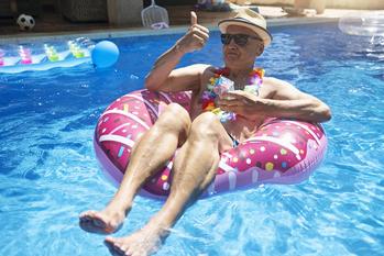 How to 10X Your Retirement Savings While Barely Lifting a Finger: https://g.foolcdn.com/editorial/images/735397/senior-man-enjoying-retirement-in-swimming-pool-2.jpg