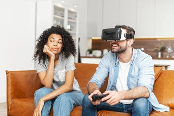Avoid Meta Platforms' Stock Until It Makes This Move: https://g.foolcdn.com/editorial/images/716938/virtual-reality-headsets-couple-on-couch-1.jpg