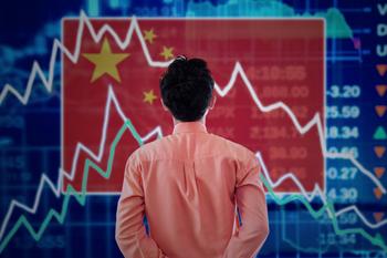 Why Alibaba Stock Ticked Lower Today: https://g.foolcdn.com/editorial/images/733651/man-examines-a-stock-chart-superimposed-on-a-chinese-flag.jpg