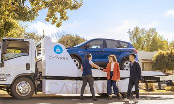 Will Carvana Stock Reach $100 by the End of 2024?: https://g.foolcdn.com/editorial/images/769899/person-greeting-delivery-driver-with-_carvana-delivery-truck-and-logo-in-background_carvana.jpg