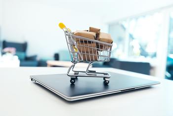 Why Shopify Stock Skyrocketed This Week: https://g.foolcdn.com/editorial/images/711648/a-mini-shopping-cart-and-packages-on-top-of-a-tablet.jpg
