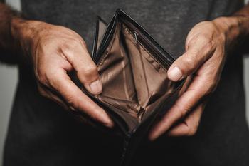Will Micron Cut Its Dividend?: https://g.foolcdn.com/editorial/images/714452/poor-empty-pocket-empty-wallet-no-money-broke-poverty.jpg