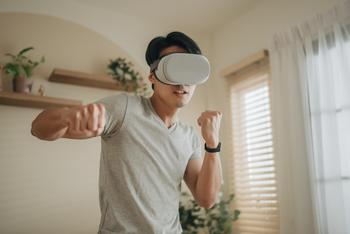 Apple's AI-Powered Initiatives Poised for Big Gains: https://g.foolcdn.com/editorial/images/733122/boxing-in-vr-headset-training-for-kicking-in-virtual-reality-1.jpg