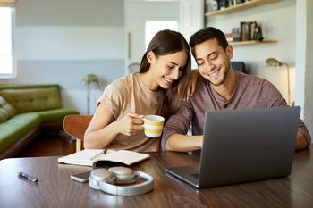 Here's an Easy Way for 87 Million Americans to Make a Lot More Money: https://g.foolcdn.com/editorial/images/696215/couple-looking-at-laptop.jpg