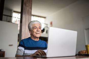 Americans Think They'll Need $1.27 Million to Retire Comfortably -- and It's Easier to Get There Than You Think: https://g.foolcdn.com/editorial/images/737265/senior-laptop-smiling-gettyimages-1390898592.jpg