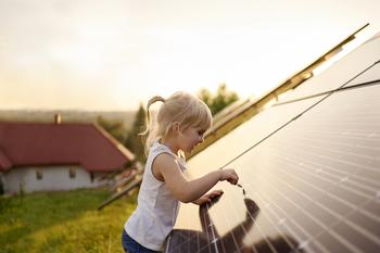 This Utility Is Making a Smart Move to Lock in Smoother Results. Is It a Buy?: https://g.foolcdn.com/editorial/images/758896/21_06_28-a-child-playing-with-a-solar-panel-_gettyimages-1271668484.jpg
