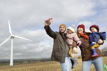 2 Stocks to Grow and Renew Your Portfolio: https://g.foolcdn.com/editorial/images/699049/a-family-all-smiles-taking-a-selfie-with-a-wind-turbine-in-background.jpg