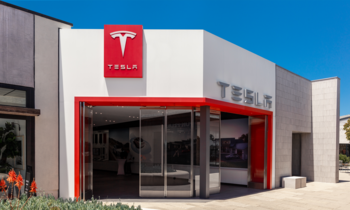Elon Musk Says You Shouldn't Invest in Tesla Stock Unless You Believe This 1 Thing About the Future: https://g.foolcdn.com/editorial/images/774313/tesla-sales-center-with-tesla-logo-on-building-for-tesla-sales.png