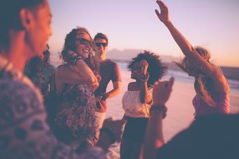 Why Revolve Stock Is Down 60% This Year: https://g.foolcdn.com/editorial/images/704487/a-group-of-friends-at-a-beach-party.jpg