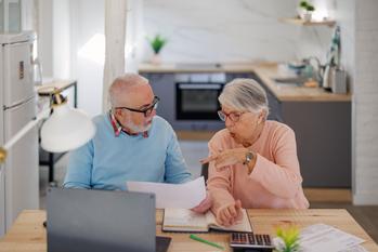 If You Can't Answer These 3 Questions, You're Not Ready for Social Security: https://g.foolcdn.com/editorial/images/715464/senior-couple-at-a-desk-serious-gettyimages-1399367653.jpg