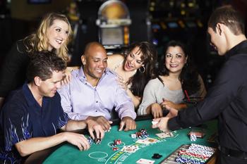 This Is the Real Story Behind Realty Income's Bellagio Buy-In: https://g.foolcdn.com/editorial/images/746662/21_05_24-five-people-at-a-casino-table-with-an-employee-dealing-cards-_gettyimages-185118796.jpg