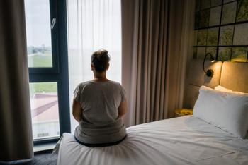 Why Sleep Number Stock Plummeted Today: https://g.foolcdn.com/editorial/images/754374/woman-on-bed-looking-out-window.jpg