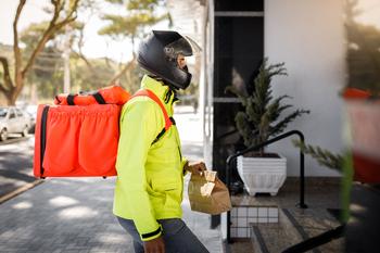 Worried About the Market Sell-Off? Here's 1 Stock to Buy Now, and 1 to Avoid: https://g.foolcdn.com/editorial/images/704473/a-delivery-rider-delivering-food-in-a-bright-yellow-jacket.jpg