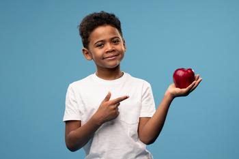 Apple Stock Is "Dead Money," According to 1 Wall Street Analyst: https://g.foolcdn.com/editorial/images/773217/little-boy-pointing-at-a-red-apple-and-smiling.jpg