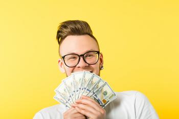 3 Top Dividend Stocks to Buy in October: https://g.foolcdn.com/editorial/images/704454/getty-man-with-cash-money-dollars-dividends-happy.jpg