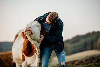 2 Reasons Dividend Investors Should Take A Chance On Tyson Foods Stock: https://g.foolcdn.com/editorial/images/737135/farmer-comforts-a-calf.jpg