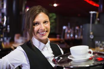 1 Reason to Buy PepsiCo (PEP) Stock That's Been a Good Reason for More Than 50 Years: https://g.foolcdn.com/editorial/images/830012/getty-smiling-happy-restaurant-worker-server-coffee.jpg