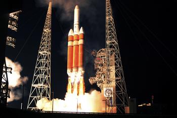 Will Jeff Bezos Buy America's Most Venerable Space Company?: https://g.foolcdn.com/editorial/images/767594/delta-iv-heavy-rocket-launch-at-night.jpg