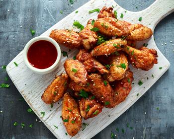 This Growth Stock's Valuation Has Gotten So Spicy It Was Time to Sell: https://g.foolcdn.com/editorial/images/770058/chicken-wings-restaurant-food-buffalo-wild-wings-1200x960-4134ff9.jpg