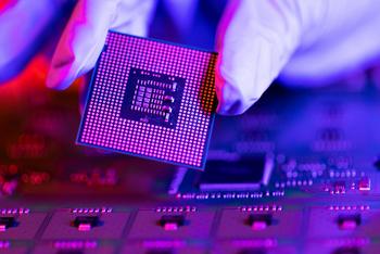 While Nvidia and SoftBank Invest Billions in Intel, You Should Consider Buying This Rival Semiconductor Stock Instead: https://g.foolcdn.com/editorial/images/835825/gettyimages-computer-chip-ai-gloves.jpg