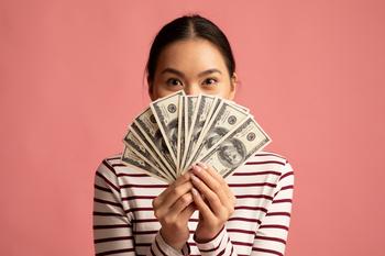 Got $1,000? Here Are 3 Ways to Turn It Into $75 or More of Annual Income.: https://g.foolcdn.com/editorial/images/751169/a-person-holding-100-bills.jpg