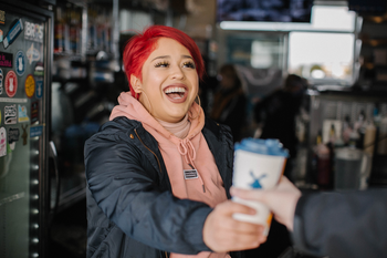 Is Dutch Bros (BROS) Stock a Buy for 2026?: https://g.foolcdn.com/editorial/images/845299/broista-handing-hot-drink.png