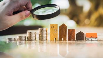Is Real Estate a Solid Investment?: https://g.foolcdn.com/editorial/images/770334/a-person-holding-a-magnifying-glass-looking-at-a-row-of-rising-coins-and-buildings.jpg