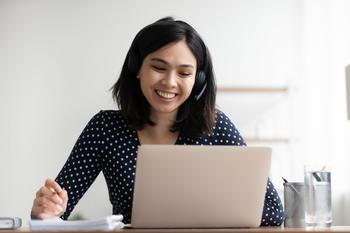 Why I'm Saving for Retirement in More Than 1 Account: https://g.foolcdn.com/editorial/images/699554/getty-listening-laptop-podcast-smiling-happy.jpg