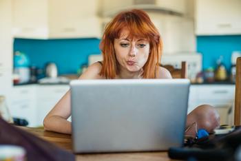 3 Signs You Shouldn't Save in Your 401(k) in 2023: https://g.foolcdn.com/editorial/images/713895/woman-looking-at-laptop-and-thinking.jpg