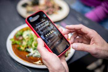 Cava Needs to Keep This Number Strong if It Wants to Keep Growing: https://g.foolcdn.com/editorial/images/748038/23_09_18-a-person-rating-their-experience-at-a-restaurant-using-an-app-on-a-cell-phone-_mf-dload.jpg