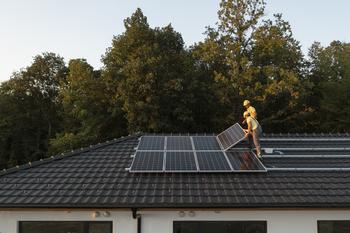 Why SolarEdge Plunged Yet Again Today: https://g.foolcdn.com/editorial/images/753506/installing-solar-panels-on-roof.jpg