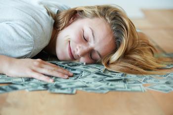 2 Vanguard ETFs to Buy With $1,000 and Hold Forever: https://g.foolcdn.com/editorial/images/834446/sleeping-on-100-bills.jpg