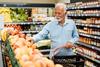 Struggling With Rising Grocery Costs? Here's How Your Medicare Plan Can Help: https://g.foolcdn.com/editorial/images/753678/senior-man-grocery-store-gettyimages-1383004162.jpg