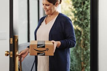 Amazon.com Stock Has 20% Upside, According to 1 Wall Street Analyst: https://g.foolcdn.com/editorial/images/774081/woman-carrying-an-amazon-box-inside-through-the-front-door-is-amzn.jpg
