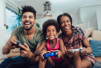 2 Under-the-Radar Gaming Stocks You Can Buy and Hold for the Next Decade: https://g.foolcdn.com/editorial/images/750428/video-games-family-fun-play-happy.jpg