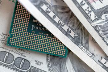 Why Texas Instruments Stock Opened 8.5% Higher Today: https://g.foolcdn.com/editorial/images/774195/semiconductor-chip-hidden-among-large-denomination-dollar-bills.jpg