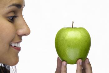 Apple Stock Has 33% Upside, According to 1 Wall Street Analyst: https://g.foolcdn.com/editorial/images/772444/young-woman-admiring-a-green-apple.jpg