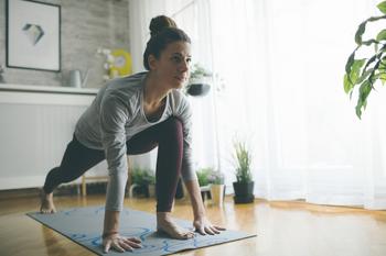 1 Growth Stock to Buy and Hold in a Market Downturn: https://g.foolcdn.com/editorial/images/750975/yoga-at-home.jpg