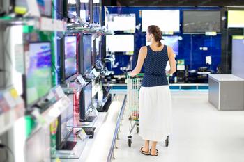 2 Reasons to Buy Walmart -- and 1 Reason to Avoid the Dividend Stock: https://g.foolcdn.com/editorial/images/769450/buying-a-tv-television-electronics-shopping.jpg