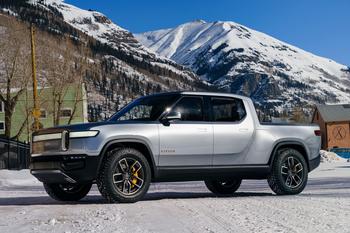Why Rivian Automotive Stock Popped, Then Dropped: https://g.foolcdn.com/editorial/images/776244/rivian-r1t-electric-pickup-in-the-snow.jpg