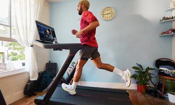 Peloton Jumped Today -- Time to Buy the Beaten-Down Stock Hand Over Fist?: https://g.foolcdn.com/editorial/images/765038/person-using-peloton-treadmill_peloton.jpg
