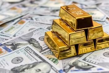 Why Gold Stocks Exploded This Week: https://g.foolcdn.com/editorial/images/731280/gold-bars-on-money-cash-wealth.jpg